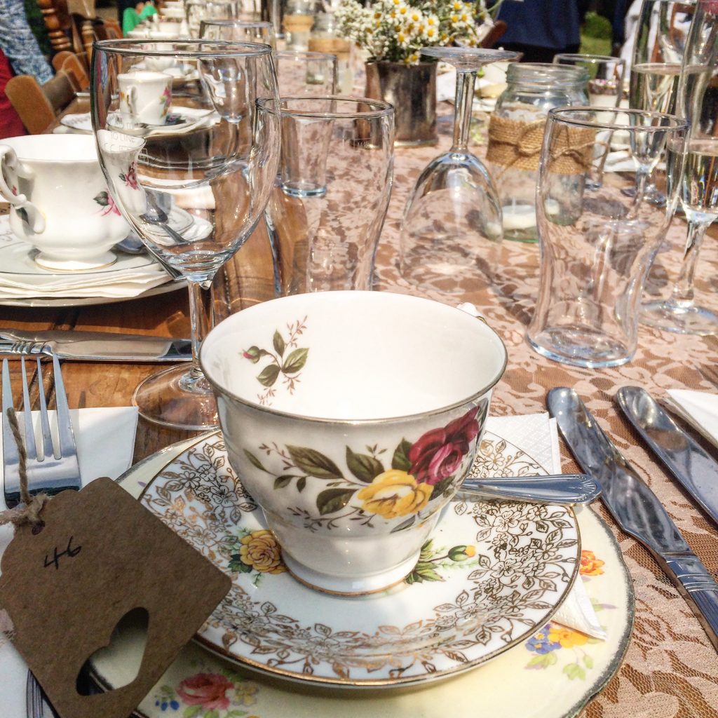 vintage china laid on a table for a wedding